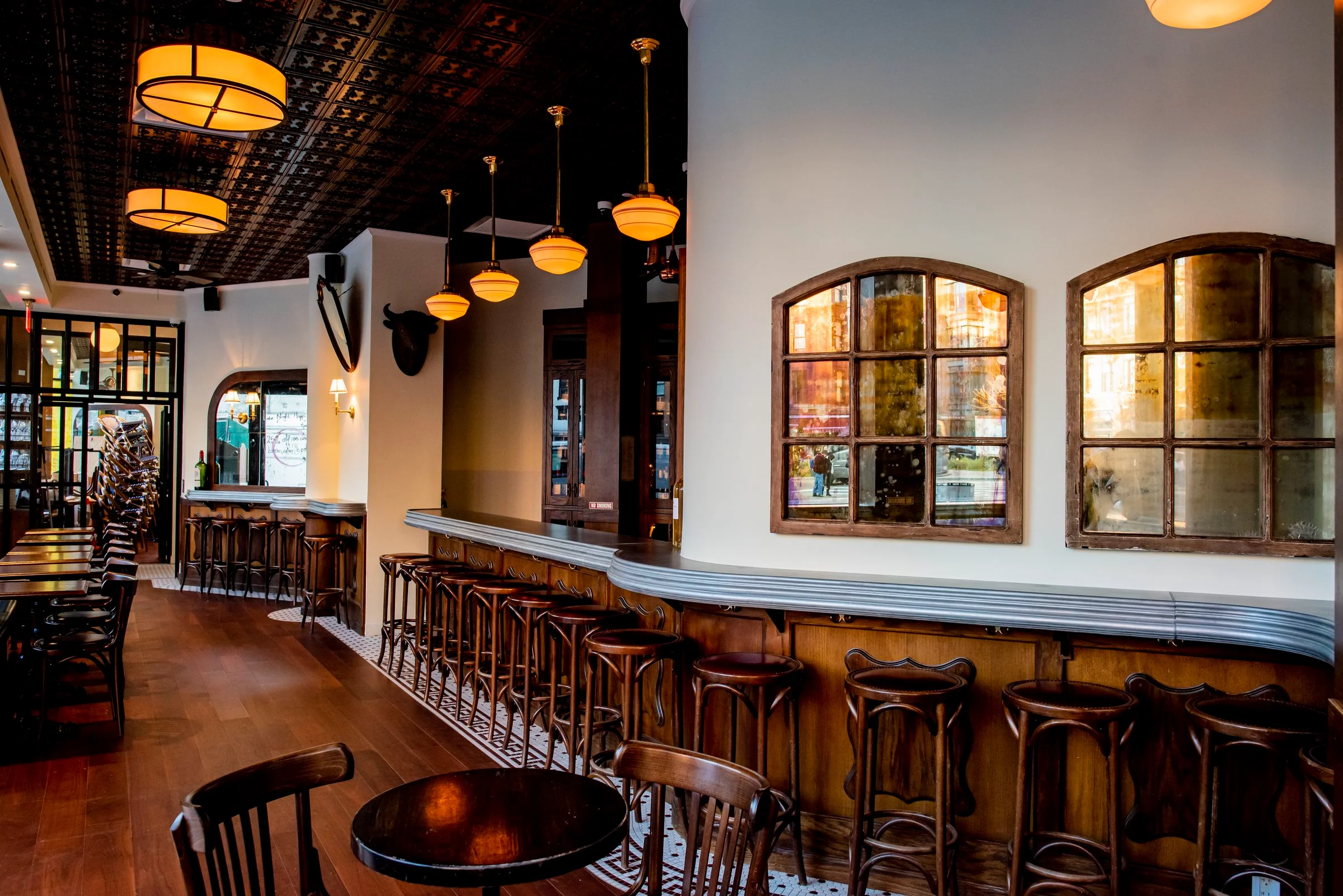 A La Bastille zinc bar top installed in a restaurant interior