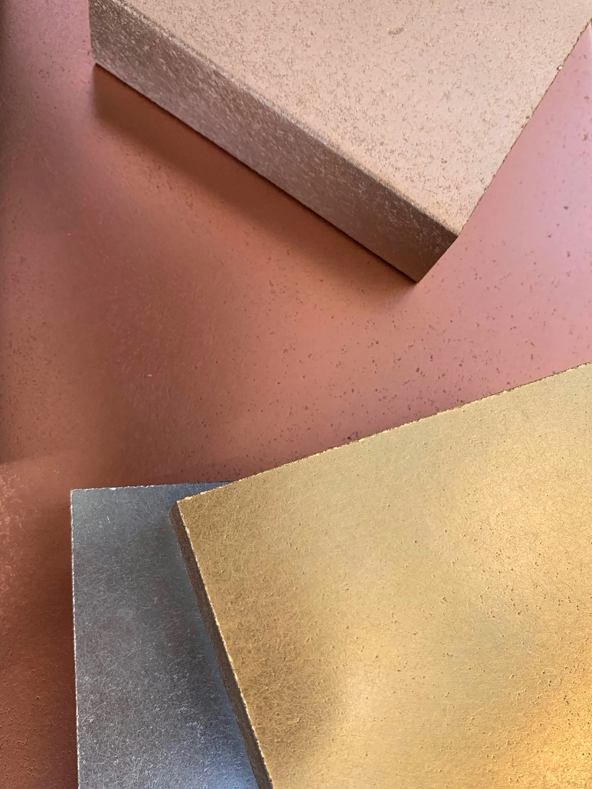 Metal finish samples showing different patinas