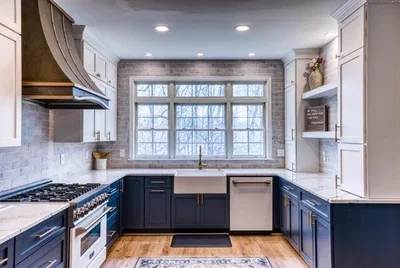 Custom cast zinc and brass range hood by La Bastille