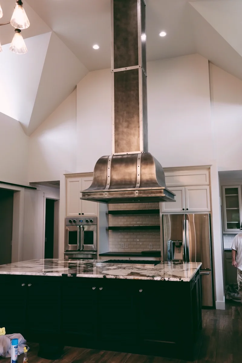Custom cast zinc range hood by La Bastille